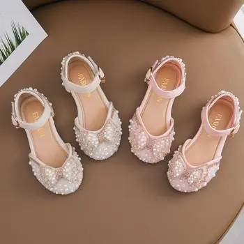 Нови детски сандали свързани с лък и пайети, сладки танцови обувки на принцесата с перли за момичета, ежедневни студентски детска празнична сватбени обувки